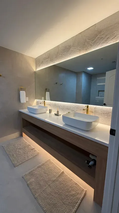 Floating double vanity with backlit mirror